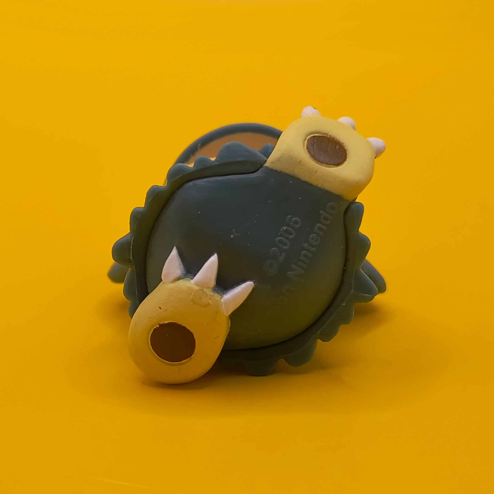 Original Munchlax Pokémon-figur fra 2006 med Nintendo-stempel i bunden.