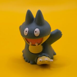 Original Munchlax Pokémon-figur fra 2006 med Nintendo-stempel i bunden.